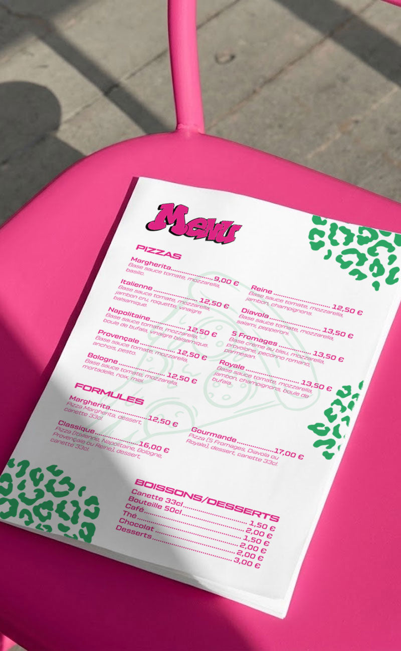 Menu de Fresh Pizza, sur une chaise rose.