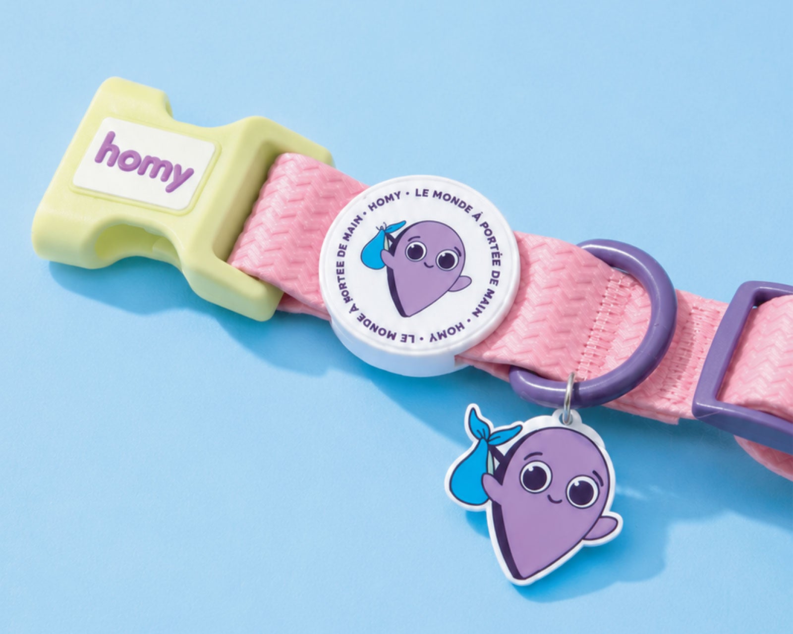 Collier pour chien Homy avec mascotte en pendantif.